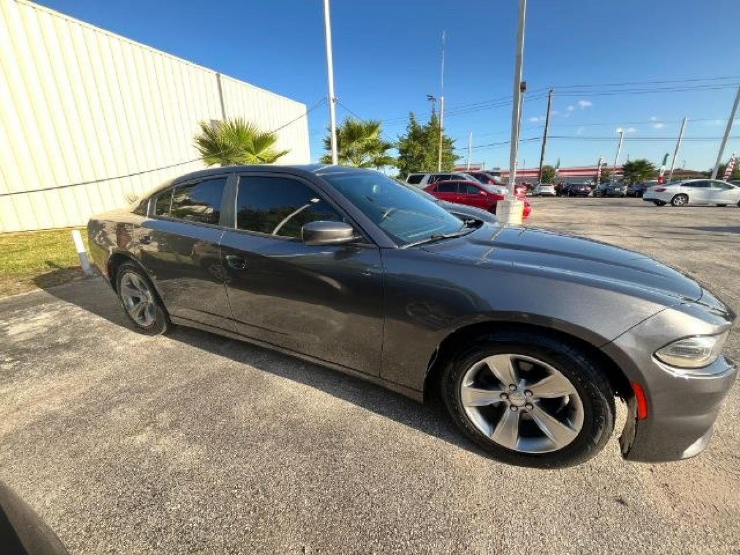 2015 Granite Crystal Meta /Black Dodge Charger SE (2C3CDXBGXFH) with an 3.6L V-6 DOHC engine, located at 4545 Spencer Hwy., Pasadena, 77504, (832) 266-1645, 29.666037, -95.173775- Photo#6