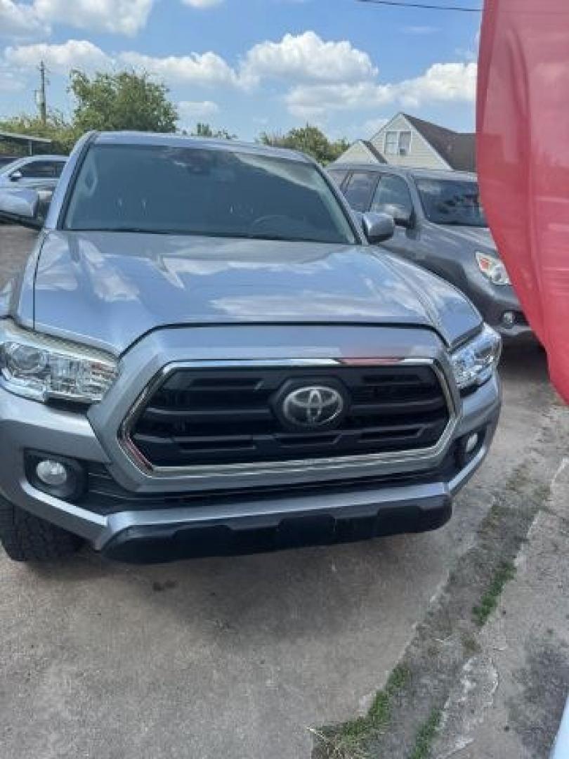 2019 Silver Sky Metallic Toyota Tacoma SR5 V6 (5TFRZ5CN3KX) with an 3.5L V-6 port/direct injection engine, located at 4545 Spencer Hwy., Pasadena, 77504, (832) 266-1645, 29.666037, -95.173775- Photo#1
