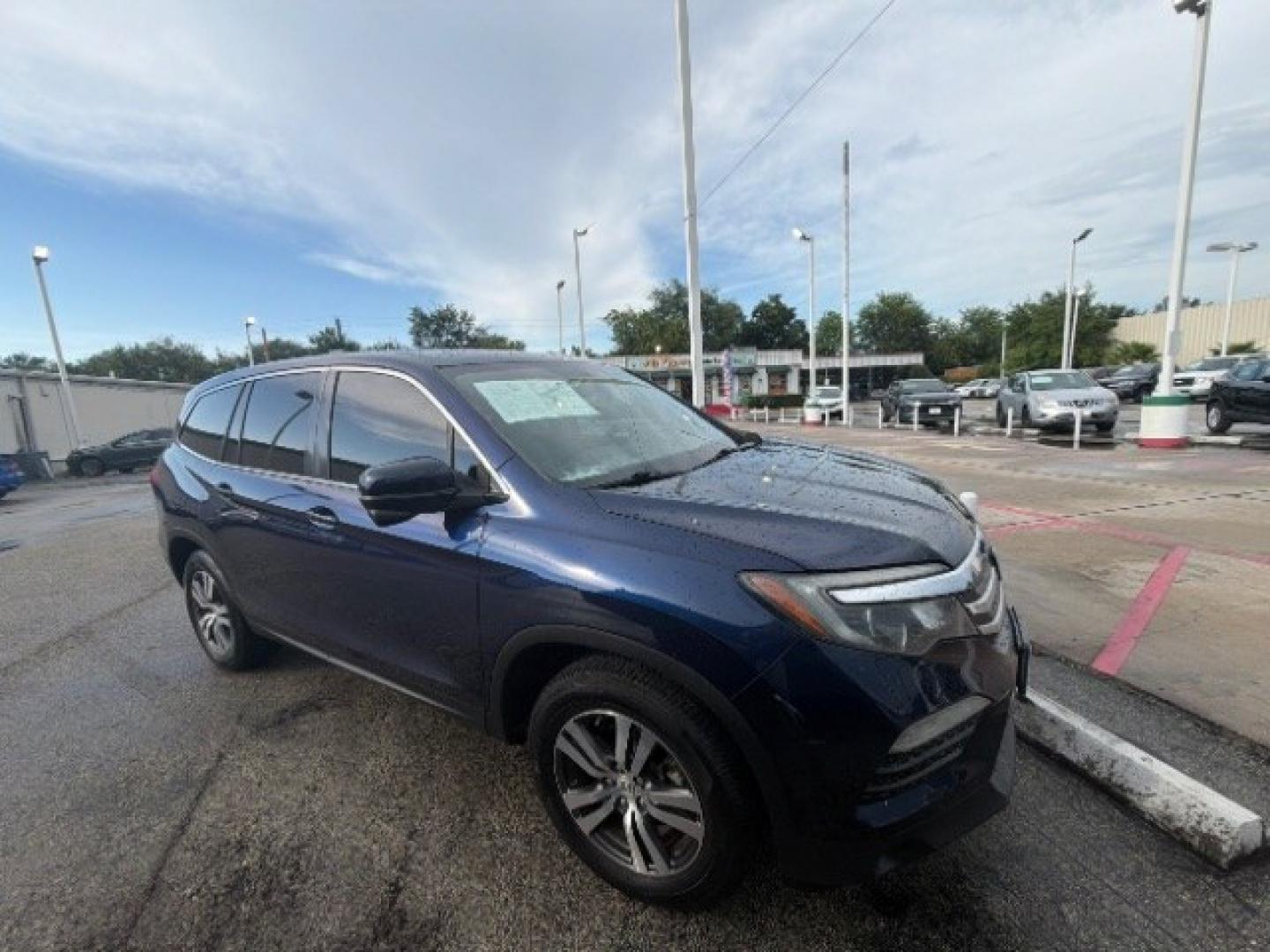 2016 Obsidian Blue Pearl /Gray Honda Pilot EX (5FNYF5H35GB) with an 3.5L V-6 gasoline direct injection engine, located at 7935 Gulf Freeway, Houston, 77017, (832) 266-1645, 29.684393, -95.275665- Photo#1