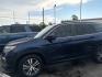 2016 Obsidian Blue Pearl /Gray Honda Pilot EX (5FNYF5H35GB) with an 3.5L V-6 gasoline direct injection engine, located at 7935 Gulf Freeway, Houston, 77017, (832) 266-1645, 29.684393, -95.275665- Photo#2