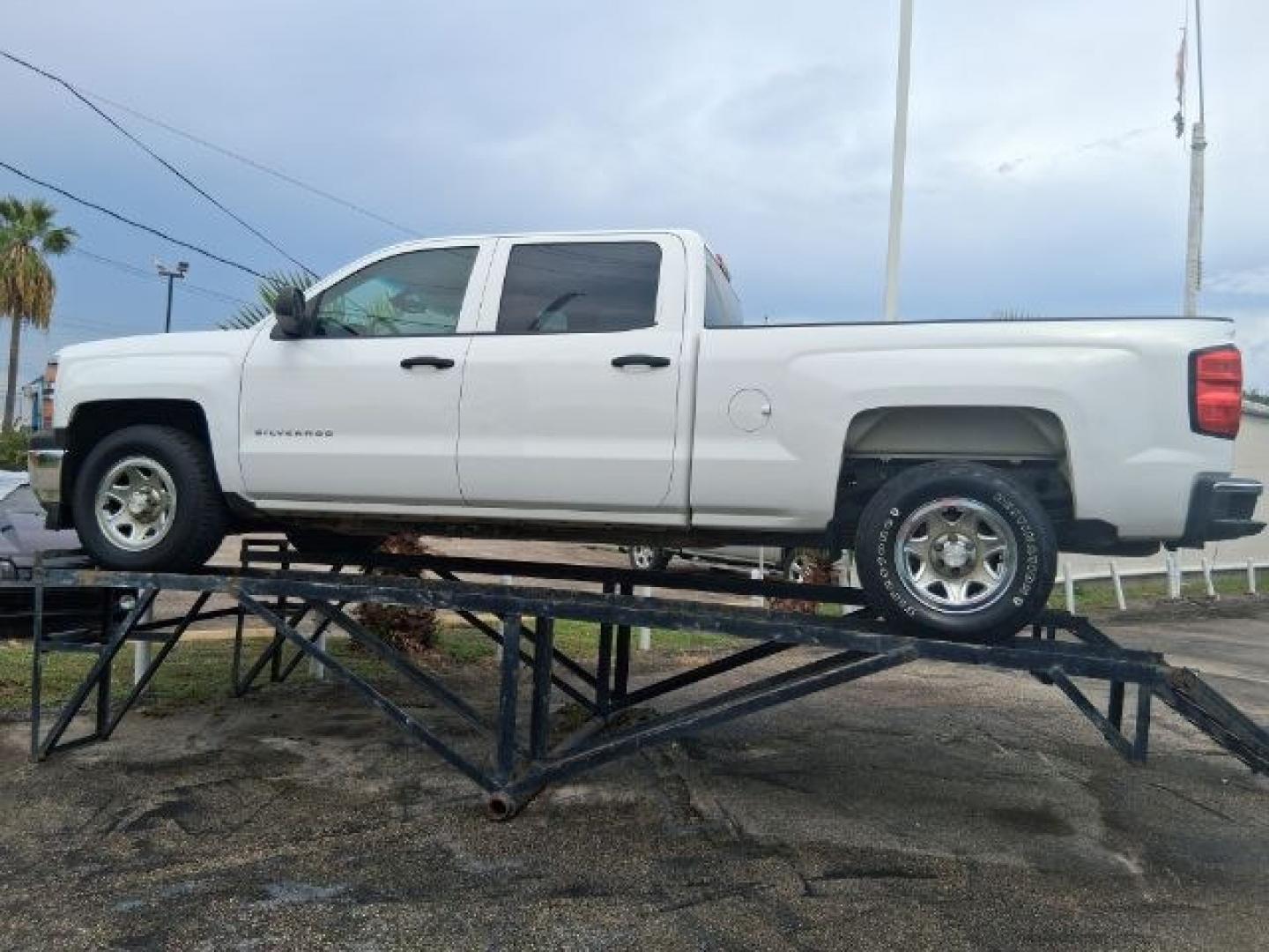 2015 Summit White /Dark Ash/Jet Black Chevrolet Silverado 1500 LS (3GCPCPEC2FG) with an EcoTec3 4.3L V-6 direct injection engine, located at 4545 Spencer Hwy., Pasadena, 77504, (832) 266-1645, 29.666037, -95.173775- Photo#2