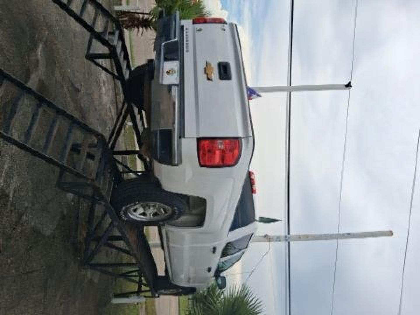 2015 Summit White /Dark Ash/Jet Black Chevrolet Silverado 1500 LS (3GCPCPEC2FG) with an EcoTec3 4.3L V-6 direct injection engine, located at 4545 Spencer Hwy., Pasadena, 77504, (832) 266-1645, 29.666037, -95.173775- Photo#3
