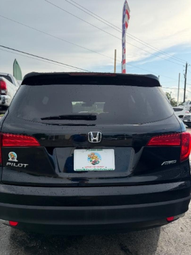 2016 Crystal Black Pearl /Black Honda Pilot EX-L (5FNYF6H62GB) with an 3.5L V-6 direct injection engine, located at 4545 Spencer Hwy., Pasadena, 77504, (832) 266-1645, 29.666037, -95.173775- Photo#4