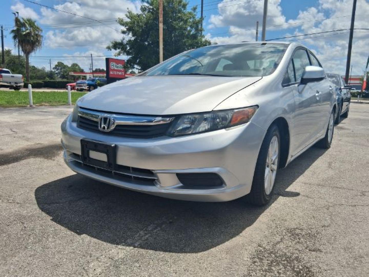 2012 Alabaster Silver Metallic Honda Civic EX (19XFB2F82CE) with an 1.8L I-4 i-VTEC variable valve control engine, located at 4545 Spencer Hwy., Pasadena, 77504, (832) 266-1645, 29.666037, -95.173775- Photo#0