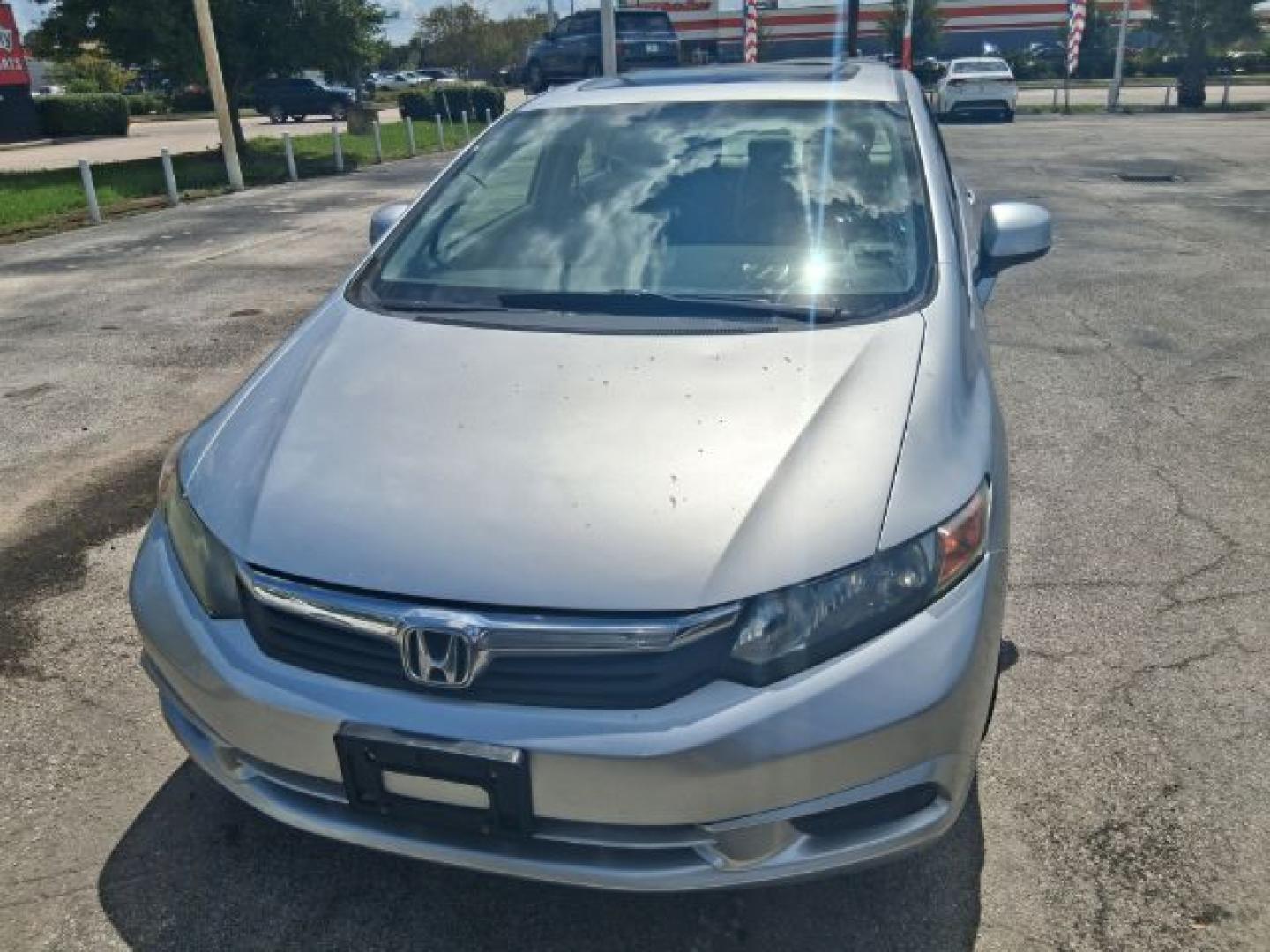 2012 Alabaster Silver Metallic Honda Civic EX (19XFB2F82CE) with an 1.8L I-4 i-VTEC variable valve control engine, located at 4545 Spencer Hwy., Pasadena, 77504, (832) 266-1645, 29.666037, -95.173775- Photo#1