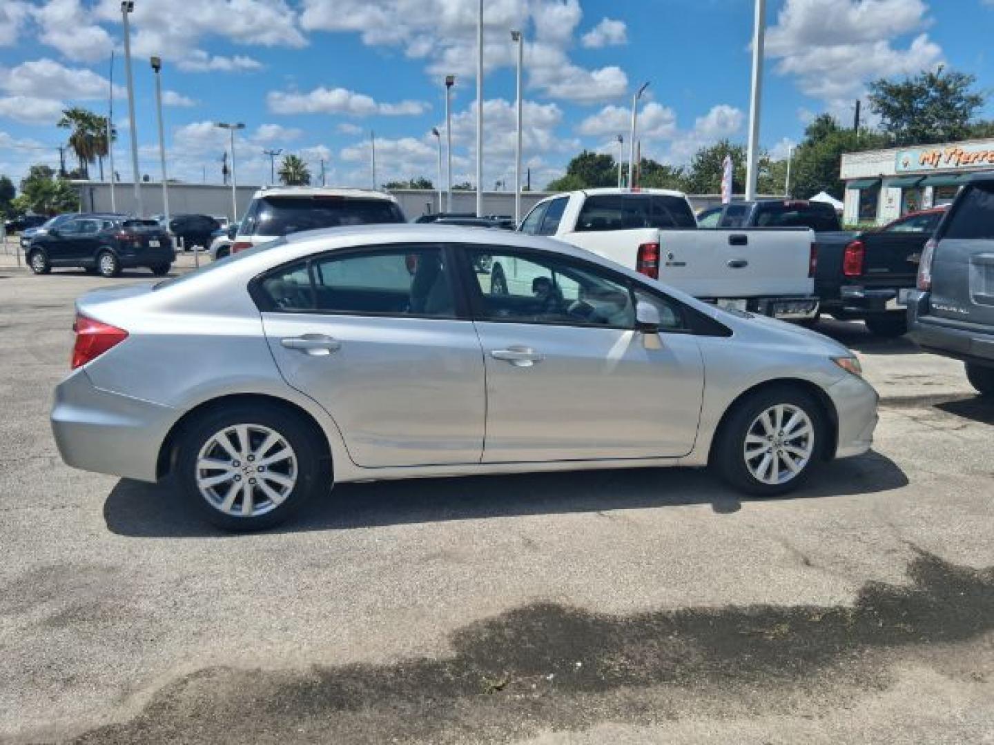2012 Alabaster Silver Metallic Honda Civic EX (19XFB2F82CE) with an 1.8L I-4 i-VTEC variable valve control engine, located at 4545 Spencer Hwy., Pasadena, 77504, (832) 266-1645, 29.666037, -95.173775- Photo#2