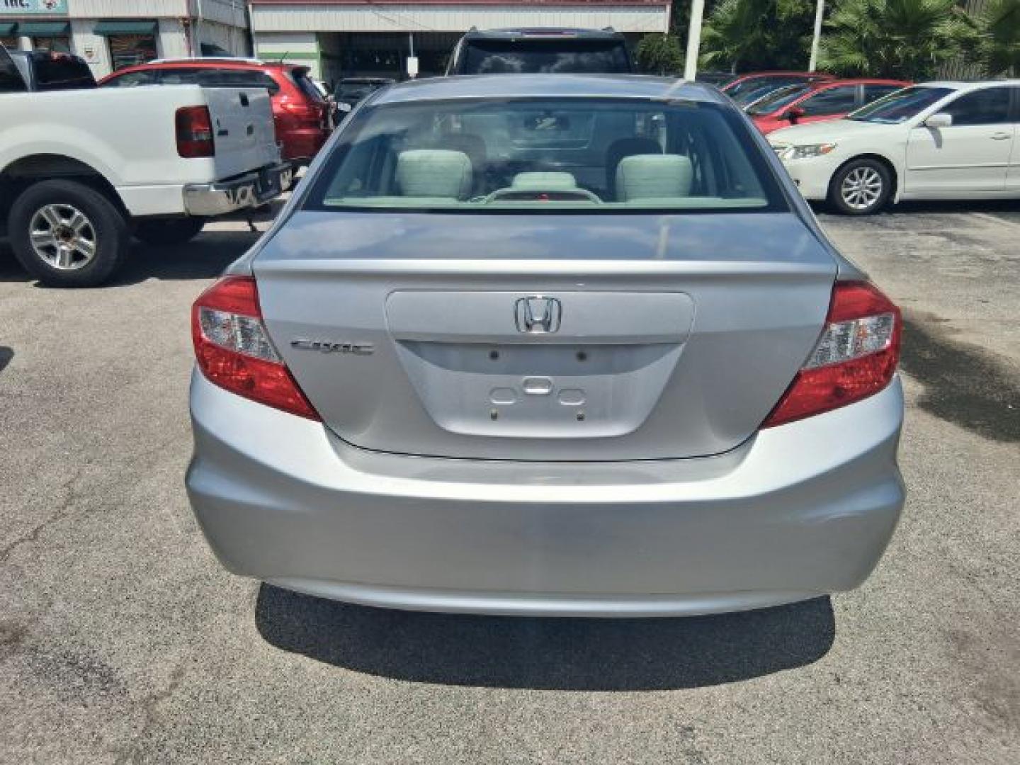 2012 Alabaster Silver Metallic Honda Civic EX (19XFB2F82CE) with an 1.8L I-4 i-VTEC variable valve control engine, located at 4545 Spencer Hwy., Pasadena, 77504, (832) 266-1645, 29.666037, -95.173775- Photo#4