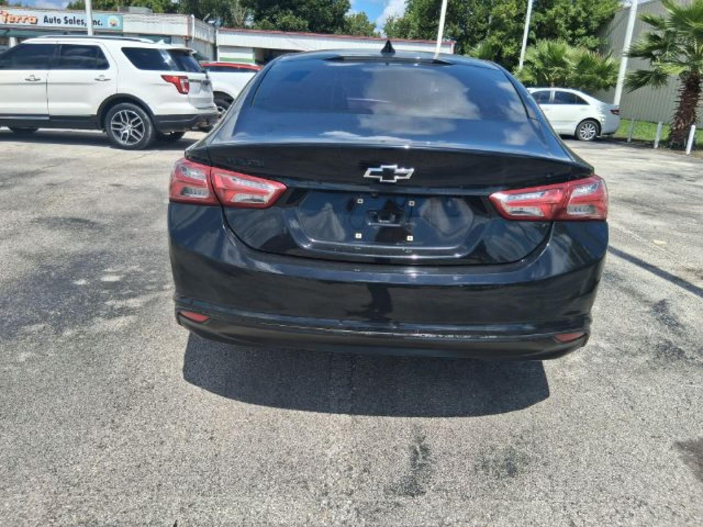 2019 Shadow Gray Metallic /Jet Black Chevrolet Malibu LT (1G1ZD5STXKF) with an ECOTEC 1.5L I-4 direct injection engine, located at 4545 Spencer Hwy., Pasadena, 77504, (832) 266-1645, 29.666037, -95.173775- Photo#2