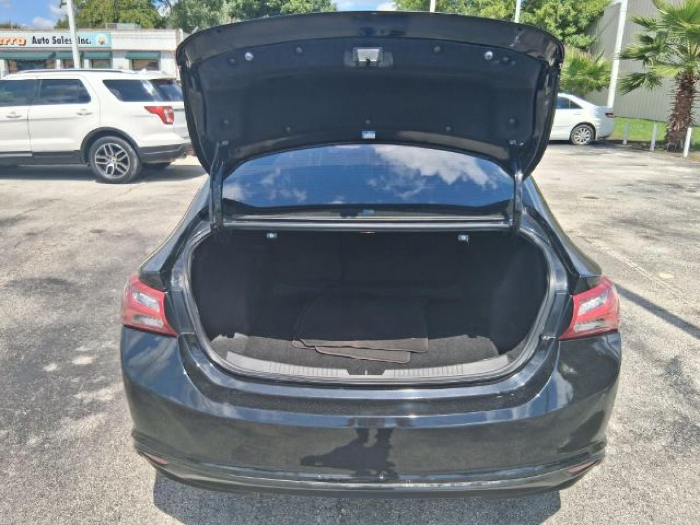 2019 Shadow Gray Metallic /Jet Black Chevrolet Malibu LT (1G1ZD5STXKF) with an ECOTEC 1.5L I-4 direct injection engine, located at 4545 Spencer Hwy., Pasadena, 77504, (832) 266-1645, 29.666037, -95.173775- Photo#4