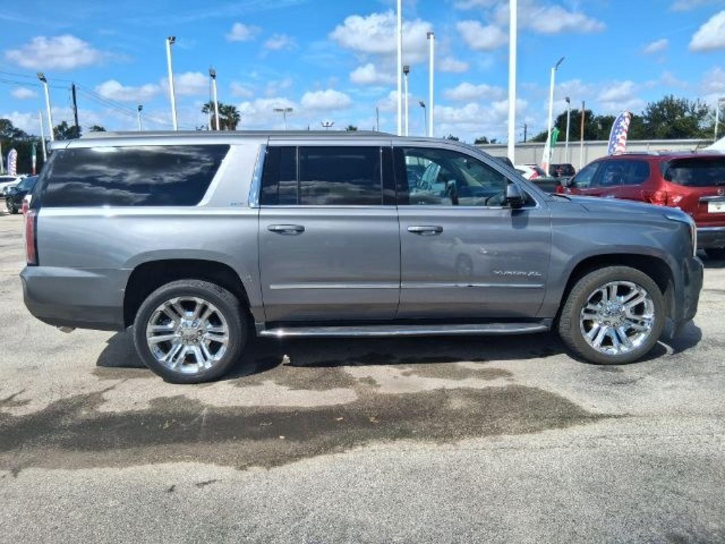 2018 Dark Sapphire Blue Metallic GMC Yukon XL SLT (1GKS2GKC5JR) with an EcoTec3 5.3L V-8 direct injection engine, located at 4545 Spencer Hwy., Pasadena, 77504, (832) 266-1645, 29.666037, -95.173775- Photo#2