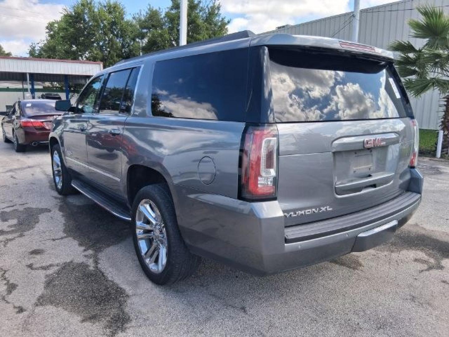2018 Dark Sapphire Blue Metallic GMC Yukon XL SLT (1GKS2GKC5JR) with an EcoTec3 5.3L V-8 direct injection engine, located at 4545 Spencer Hwy., Pasadena, 77504, (832) 266-1645, 29.666037, -95.173775- Photo#3
