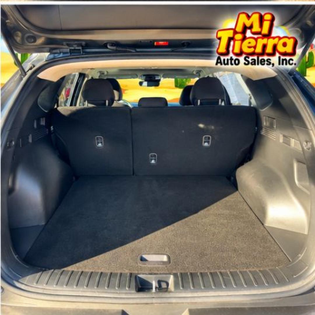 2022 Amazon Gray Hyundai Tucson SEL (5NMJF3AE0NH) with an Smartstream 2.5L I-4 port/direct injection engine, located at 7935 Gulf Freeway, Houston, 77017, (832) 266-1645, 29.684393, -95.275665- Photo#5