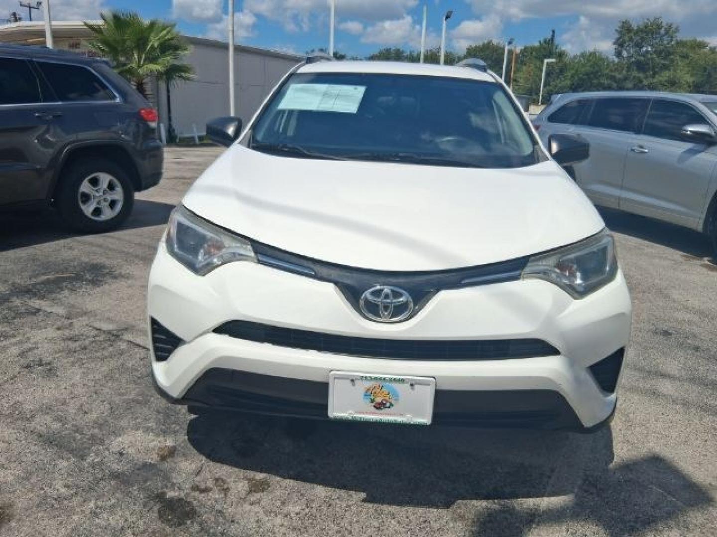 2018 Super White /Black Toyota RAV4 LE (2T3ZFREV7JW) with an 2.5L I-4 DOHC engine, located at 4545 Spencer Hwy., Pasadena, 77504, (832) 266-1645, 29.666037, -95.173775- Photo#1