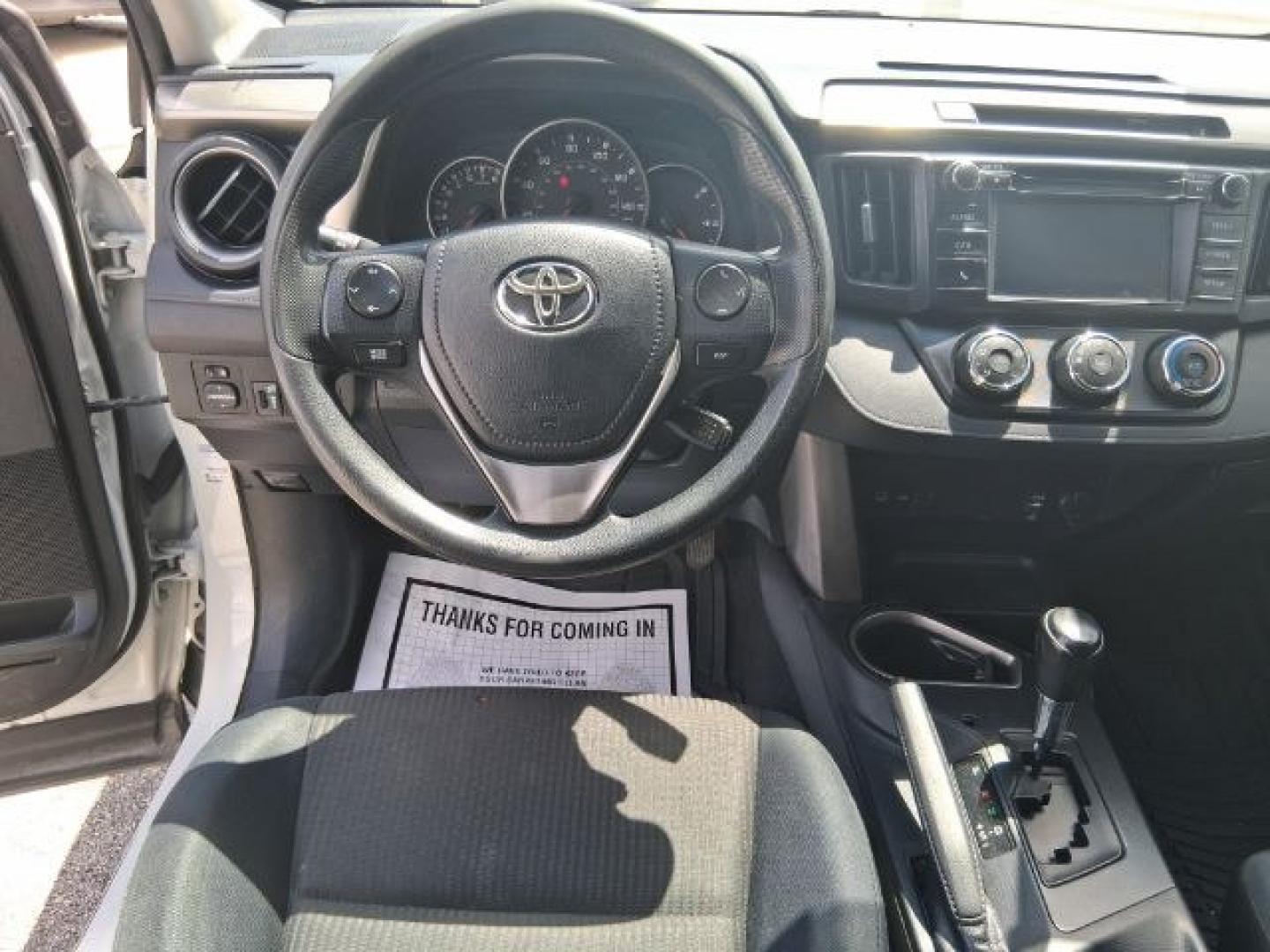 2018 Super White /Black Toyota RAV4 LE (2T3ZFREV7JW) with an 2.5L I-4 DOHC engine, located at 4545 Spencer Hwy., Pasadena, 77504, (832) 266-1645, 29.666037, -95.173775- Photo#4