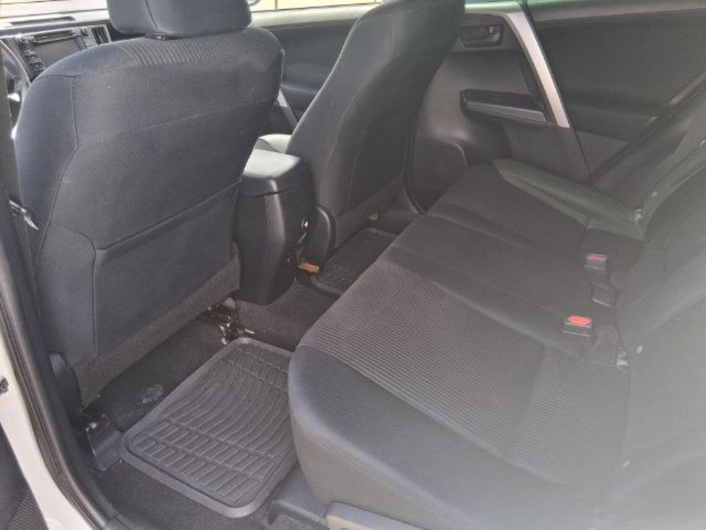 2018 Super White /Black Toyota RAV4 LE (2T3ZFREV7JW) with an 2.5L I-4 DOHC engine, located at 4545 Spencer Hwy., Pasadena, 77504, (832) 266-1645, 29.666037, -95.173775- Photo#6