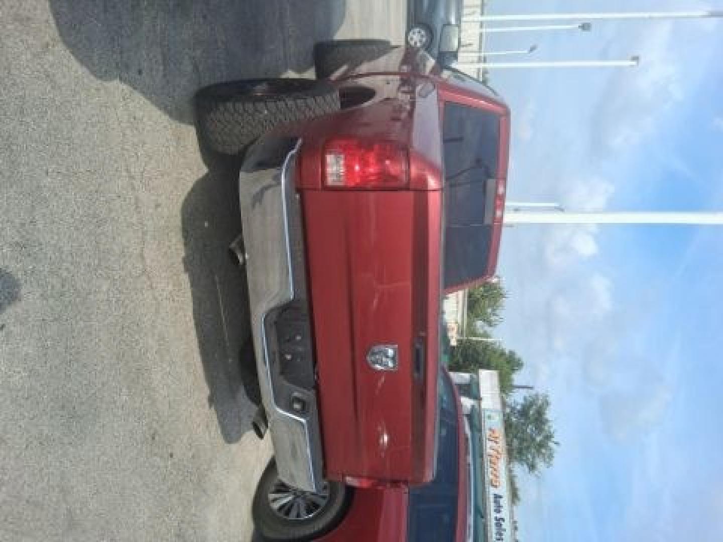 2013 Flame Red /Black/Diesel Gray Cloth Interior RAM 1500 Tradesman Regular Cab SWB 2WD (3C6JR6AT6DG) with an 5.7L V8 OHV 16V engine, 6-Speed Automatic transmission, located at 4545 Spencer Hwy., Pasadena, 77504, (832) 266-1645, 29.666037, -95.173775- Photo#2