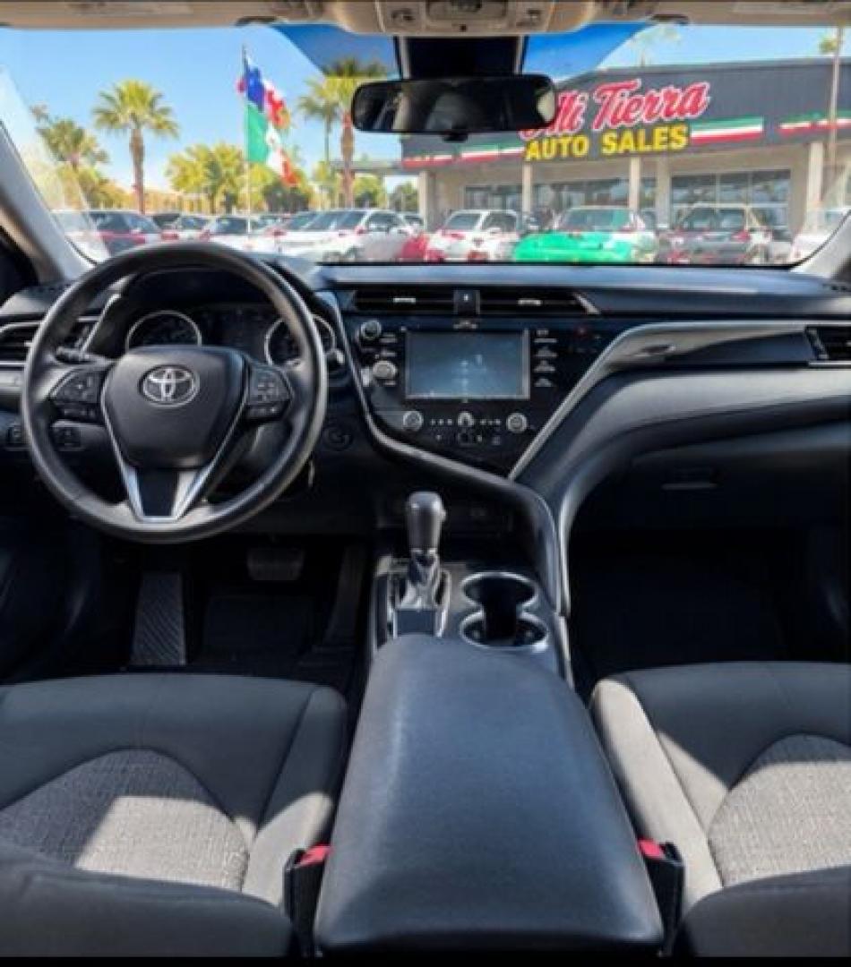 2019 Supersonic Red Toyota Camry LE (4T1B11HKXKU) with an Dynamic Force 2.5L I-4 port/direct injection engine, located at 7935 Gulf Freeway, Houston, 77017, (832) 266-1645, 29.684393, -95.275665- Photo#4
